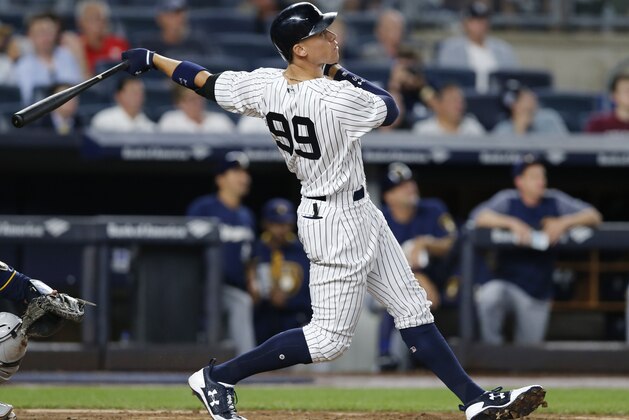 FILE - In this July 7, 2017, file photo, New York Yankees' Aaron Judge watches his fifth-inning solo home run in the team's baseball game against the Milwaukee Brewers, in New York. This time last year, Aaron Judge had played exactly zero big-league games. The New York Yankees' rookie slugger is now an All-Star and MVP hopeful. Big things are happening for one of baseball's biggest men.  (AP Photo/Kathy Willens, File)