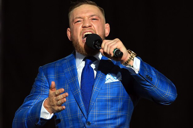 TORONTO, ON - JULY 12:   Conor McGregor speaks during the Floyd Mayweather Jr. v Conor McGregor World Press Tour at Budweiser Stage on July 12, 2017 in Toronto, Canada.  (Photo by Vaughn Ridley/Getty Images)