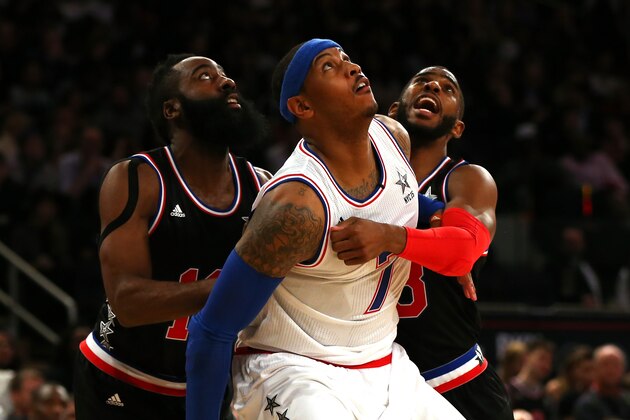 NEW YORK, NY - FEBRUARY 15:  Carmelo Anthony #7 of the New York Knicks and the Eastern Conference looks on against James Harden #13 of the Houston Rockets and the Western Conference and Chris Paul #3 of the Los Angeles Clippers and the Western Conference during the 2015 NBA All-Star Game at Madison Square Garden on February 15, 2015 in New York City.  NOTE TO USER: User expressly acknowledges and agrees that, by downloading and/or using this photograph, user is consenting to the terms and conditions of the Getty Images License Agreement.  (Photo by Elsa/Getty Images)