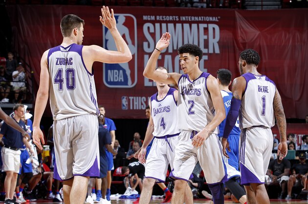 LAS VEGAS, NV - JULY 12: Ivica Zubac #40 and Lonzo Ball #2 of the Los Angeles Lakers high five each other during the game against the Philadelphia 76ers during the 2017 Las Vegas Summer League on July 12, 2017 at the Thomas & Mack Center in Las Vegas, Nevada. NOTE TO USER: User expressly acknowledges and agrees that, by downloading and or using this Photograph, user is consenting to the terms and conditions of the Getty Images License Agreement. Mandatory Copyright Notice: Copyright 2017 NBAE (Photo by Jack Arent/NBAE via Getty Images) LAS VEGAS, NV - JULY 12: Ivica Zubac #40 and Lonzo Ball #2 of the Los Angeles Lakers high five each other during the game against the Philadelphia 76ers during the 2017 Las Vegas Summer League on July 12, 2017 at the Thomas & Mack Center in Las Vegas, Nevada. NOTE TO USER: User expressly acknowledges and agrees that, by downloading and or using this Photograph, user is consenting to the terms and conditions of the Getty Images License Agreement. Mandatory Copyright Notice: Copyright 2017 NBAE (Photo by Jack Arent/NBAE via Getty Images)