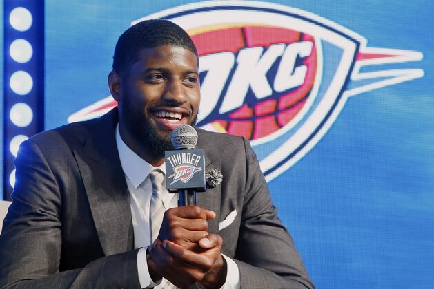 Oklahoma City Thunder forward Paul George speaks to at a rally to introduce him to fans in Oklahoma City, Wednesday, July 12, 2017. (AP Photo/Sue Ogrocki) Oklahoma City Thunder forward Paul George speaks to at a rally to introduce him to fans in Oklahoma City, Wednesday, July 12, 2017. (AP Photo/Sue Ogrocki)