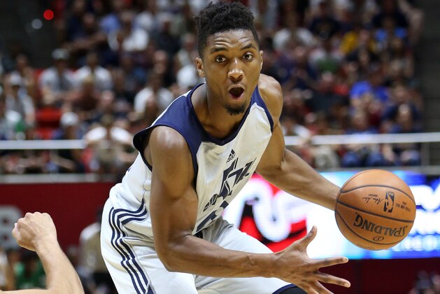 SALT LAKE CITY, UT - JULY 6: Donovan Mitchell #45 of the Utah Jazz handles the ball against the Boston Celtics during the 2017 Utah Summer League on July 6, 2017 at Jon M. Huntsman Center in Salt Lake City, Utah. NOTE TO USER: User expressly acknowledges and agrees that, by downloading and or using this Photograph, User is consenting to the terms and conditions of the Getty Images License Agreement. Mandatory Copyright Notice: Copyright 2017 NBAE (Photo by Melissa Majchrzak/NBAE via Getty Images) SALT LAKE CITY, UT - JULY 6: Donovan Mitchell #45 of the Utah Jazz handles the ball against the Boston Celtics during the 2017 Utah Summer League on July 6, 2017 at Jon M. Huntsman Center in Salt Lake City, Utah. NOTE TO USER: User expressly acknowledges and agrees that, by downloading and or using this Photograph, User is consenting to the terms and conditions of the Getty Images License Agreement. Mandatory Copyright Notice: Copyright 2017 NBAE (Photo by Melissa Majchrzak/NBAE via Getty Images)