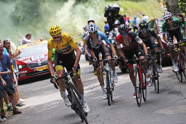 Britain's Chris Froome, wearing the overall leader's yellow jersey, France's Romain Bardet, Colombia's Nairo Quintana, Australia's Richie Porte, and Italy's Fabio Aru, from left to right, climb during the ninth stage of the Tour de France cycling race over 181.5 kilometers (112.8 miles) with start in Nantua and finish in Chambery, France, Sunday, July 9, 2017. (AP Photo/Christophe Ena) Britain's Chris Froome, wearing the overall leader's yellow jersey, France's Romain Bardet, Colombia's Nairo Quintana, Australia's Richie Porte, and Italy's Fabio Aru, from left to right, climb during the ninth stage of the Tour de France cycling race over 181.5 kilometers (112.8 miles) with start in Nantua and finish in Chambery, France, Sunday, July 9, 2017. (AP Photo/Christophe Ena)