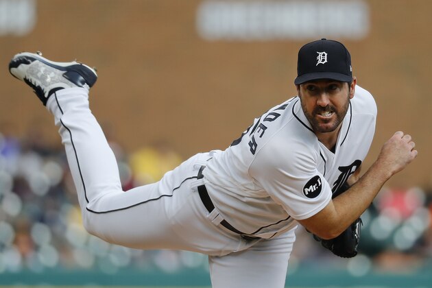 Detroit Tigers pitcher Justin Verlander watches a throw to the Kansas City Royals during the first inning of a baseball game in Detroit, Tuesday, June 27, 2017. (AP Photo/Paul Sancya)