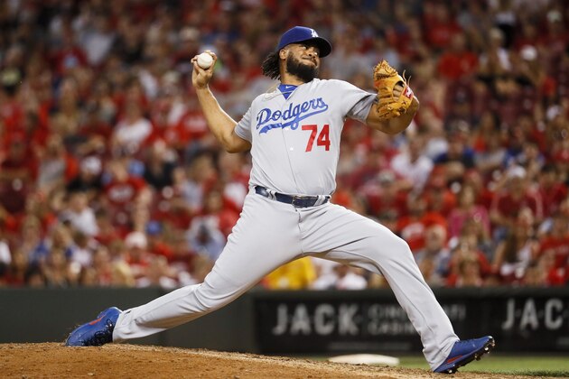 Los Angeles Dodgers relief pitcher Kenley Jansen throws in the ninth inning of a baseball game against the Cincinnati Reds, Friday, June 16, 2017, in Cincinnati. (AP Photo/John Minchillo)
