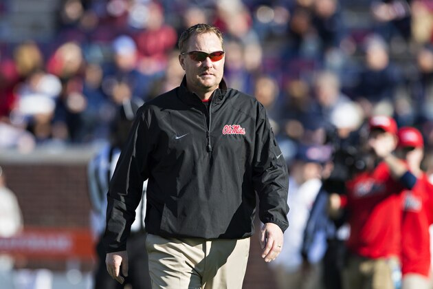 OXFORD, MS - NOVEMBER 26:  Head Coach Hugh Freeze of the Mississippi Rebels watches his team warm up before a game against the Mississippi State Bulldogs at Vaught-Hemingway Stadium on November 26, 2016 in Oxford, Mississippi.  The Bulldogs defeated the Rebels 55-20.  (Photo by Wesley Hitt/Getty Images)