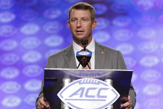 Clemson head coach Dabo Swinney speaks to the media during the Atlantic Coast Conference NCAA college football media day in Charlotte, N.C., Thursday, July 13, 2017. (AP Photo/Chuck Burton) Clemson head coach Dabo Swinney speaks to the media during the Atlantic Coast Conference NCAA college football media day in Charlotte, N.C., Thursday, July 13, 2017. (AP Photo/Chuck Burton)