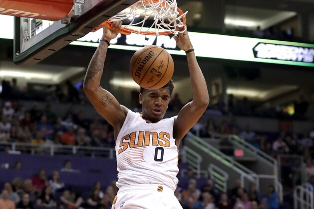 Phoenix Suns forward Marquese Chriss (0) dunks against the Sacramento Kings during the second half of an NBA basketball game, Wednesday, March 15, 2017, in Phoenix. (AP Photo/Matt York) Phoenix Suns forward Marquese Chriss (0) dunks against the Sacramento Kings during the second half of an NBA basketball game, Wednesday, March 15, 2017, in Phoenix. (AP Photo/Matt York)