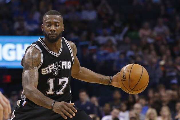 San Antonio Spurs guard Jonathon Simmons (17) is pictured in the fourth quarter of an NBA basketball game against the Oklahoma City Thunder in Oklahoma City, Saturday, March 26, 2016. Oklahoma City won 111-92. (AP Photo/Sue Ogrocki) San Antonio Spurs guard Jonathon Simmons (17) is pictured in the fourth quarter of an NBA basketball game against the Oklahoma City Thunder in Oklahoma City, Saturday, March 26, 2016. Oklahoma City won 111-92. (AP Photo/Sue Ogrocki)