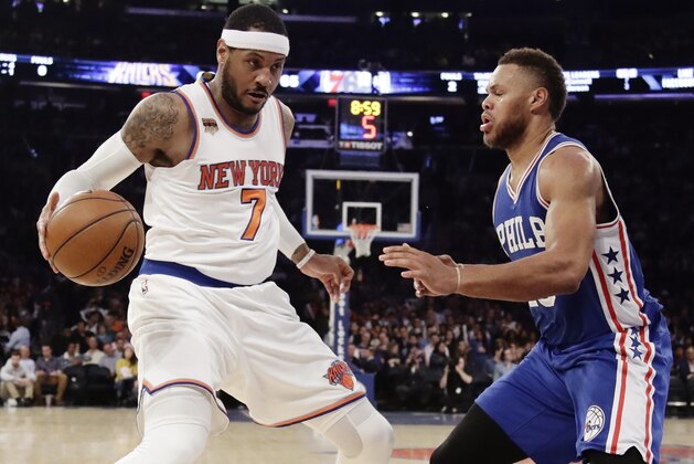 New York Knicks' Carmelo Anthony (7) is defended by Philadelphia 76ers' Justin Anderson (23) during the second half of an NBA basketball game, Wednesday, April 12, 2017, in New York. The Knicks won 114-113. (AP Photo/Frank Franklin II) New York Knicks' Carmelo Anthony (7) is defended by Philadelphia 76ers' Justin Anderson (23) during the second half of an NBA basketball game, Wednesday, April 12, 2017, in New York. The Knicks won 114-113. (AP Photo/Frank Franklin II)