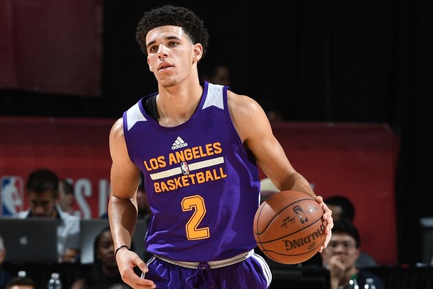 LAS VEGAS, NV - JULY 13: Lonzo Ball #2 of the Los Angeles Lakers handles the ball against the Cleveland Cavaliers on July 13, 2017 at the Thomas & Mack Center in Las Vegas, Nevada. NOTE TO USER: User expressly acknowledges and agrees that, by downloading and/or using this Photograph, user is consenting to the terms and conditions of the Getty Images License Agreement. Mandatory Copyright Notice: Copyright 2017 NBAE (Photo by Garrett Ellwood/NBAE via Getty Images) LAS VEGAS, NV - JULY 13: Lonzo Ball #2 of the Los Angeles Lakers handles the ball against the Cleveland Cavaliers on July 13, 2017 at the Thomas & Mack Center in Las Vegas, Nevada. NOTE TO USER: User expressly acknowledges and agrees that, by downloading and/or using this Photograph, user is consenting to the terms and conditions of the Getty Images License Agreement. Mandatory Copyright Notice: Copyright 2017 NBAE (Photo by Garrett Ellwood/NBAE via Getty Images)