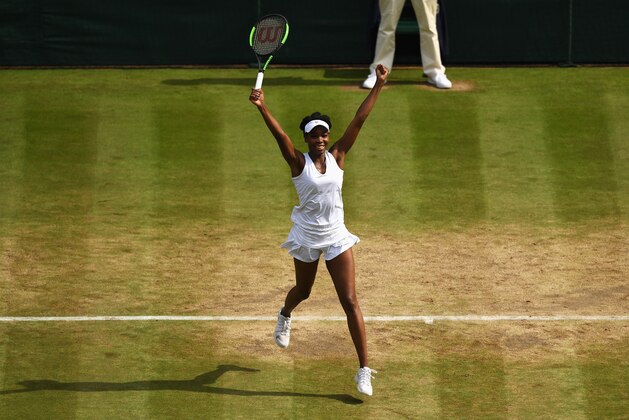 LONDON, ENGLAND - JULY 13:  Venus Williams of The United States celebrates match point and victory during the Ladies Singles semi final match against Johanna Konta of Great Britain on day ten of the Wimbledon Lawn Tennis Championships at the All England Lawn Tennis and Croquet Club at Wimbledon on July 13, 2017 in London, England.  (Photo by Shaun Botterill/Getty Images)