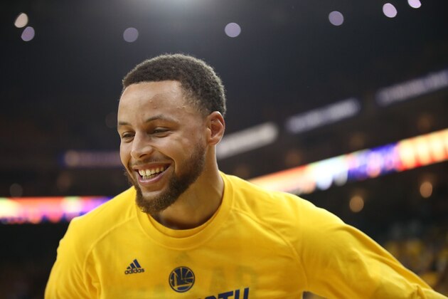 OAKLAND, CA - MAY 04:  Stephen Curry #30 of the Golden State Warriors enjoys a laugh prior to Game Two of the NBA Western Conference Semi-Finals against the Utah Jazz at ORACLE Arena on May 4, 2017 in Oakland, California.  NOTE TO USER: User expressly acknowledges and agrees that, by downloading and or using this photograph, User is consenting to the terms and conditions of the Getty Images License Agreement.  (Photo by Ezra Shaw/Getty Images)