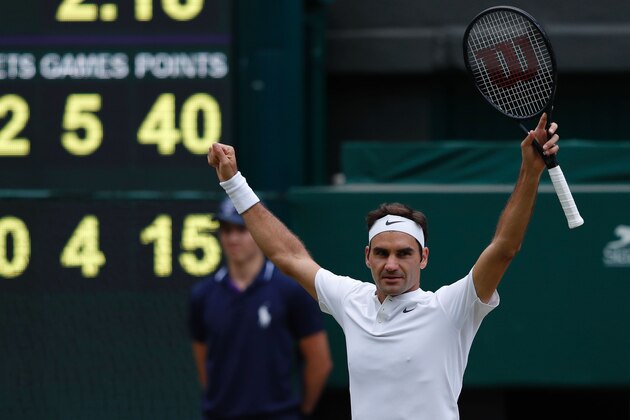 Switzerland's Roger Federer celebrates after winning against Czech Republic's Tomas Berdych during their men's singles semi-final match on the eleventh day of the 2017 Wimbledon Championships at The All England Lawn Tennis Club in Wimbledon, southwest London, on July 14, 2017.
Federer won the match 7-6, 7-6, 6-4. / AFP PHOTO / Adrian DENNIS / RESTRICTED TO EDITORIAL USE (Photo credit should read ADRIAN DENNIS/AFP/Getty Images) Switzerland's Roger Federer celebrates after winning against Czech Republic's Tomas Berdych during their men's singles semi-final match on the eleventh day of the 2017 Wimbledon Championships at The All England Lawn Tennis Club in Wimbledon, southwest London, on July 14, 2017.
Federer won the match 7-6, 7-6, 6-4. / AFP PHOTO / Adrian DENNIS / RESTRICTED TO EDITORIAL USE (Photo credit should read ADRIAN DENNIS/AFP/Getty Images)