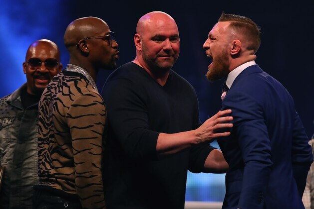LONDON, ENGLAND - JULY 14:  Dana White splits Floyd Mayweather Jr. and Conor McGregor apart during the Floyd Mayweather Jr. v Conor McGregor World Press Tour at SSE Arena on July 14, 2017 in London, England.  (Photo by Matthew Lewis/Getty Images)