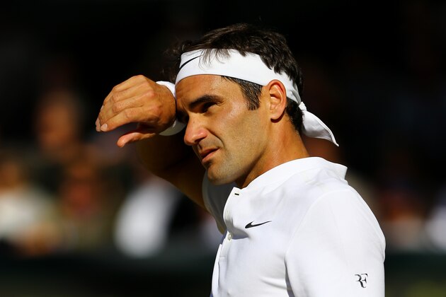LONDON, ENGLAND - JULY 14:  Roger Federer of Switzerland reacts during the Gentlemen's Singles semi final match against Tomas Berdych of The Czech Republic on day eleven of the Wimbledon Lawn Tennis Championships at the All England Lawn Tennis and Croquet Club at Wimbledon at Wimbledon on July 14, 2017 in London, England.  (Photo by Gareth Fuller - Pool/Getty Images)