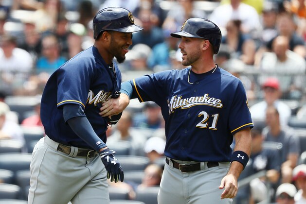 NEW YORK, NY - JULY 08:  Domingo Santana #16 of the Milwaukee Brewers celebrates with Travis Shaw #21 after hitting a three run home run against the New York Yankees in the first inning during their game at Yankee Stadium on July 8, 2017 in New York City.  (Photo by Al Bello/Getty Images)