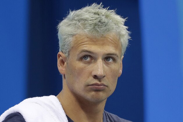 FILE - In this Aug. 9, 2016, file photo, United States' Ryan Lochte prepares before a men's 4x200-meter freestyle heat at the 2016 Summer Olympics, in Rio de Janeiro, Brazil. Lochte says he feels