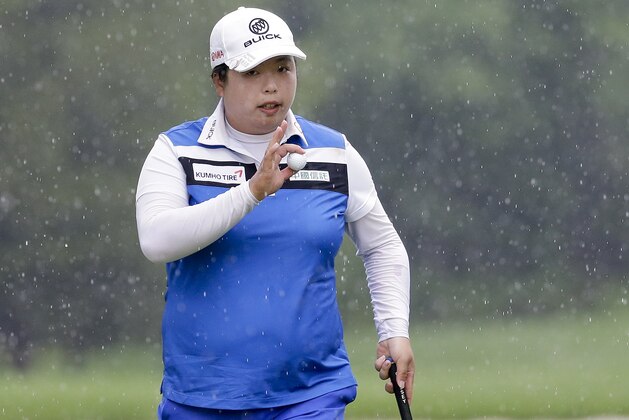 China's Shanshan Feng reacts after sinking a putt on the second green during the second round of the U.S. Women's Open Golf tournament Friday, July 14, 2017, in Bedminster, N.J. (AP Photo/Seth Wenig)