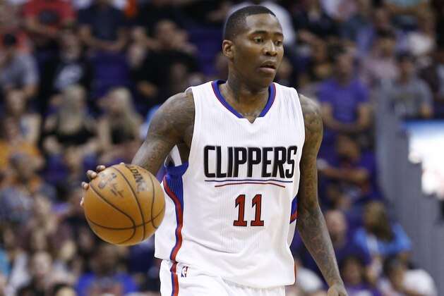 Los Angeles Clippers' Jamal Crawford (11) dribbles the ball against the Phoenix Suns during the first half of an NBA basketball game Thursday, March 30, 2017, in Phoenix. (AP Photo/Ross D. Franklin) Los Angeles Clippers' Jamal Crawford (11) dribbles the ball against the Phoenix Suns during the first half of an NBA basketball game Thursday, March 30, 2017, in Phoenix. (AP Photo/Ross D. Franklin)