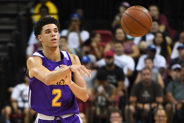 LAS VEGAS, NV - JULY 13:  Lonzo Ball #2 of the Los Angeles Lakers passes the ball up the court against the Cleveland Cavaliers during the 2017 Summer League at the Thomas & Mack Center on July 13, 2017 in Las Vegas, Nevada. Los Angeles won 94-83. NOTE TO USER: User expressly acknowledges and agrees that, by downloading and or using this photograph, User is consenting to the terms and conditions of the Getty Images License Agreement.  (Photo by Ethan Miller/Getty Images)