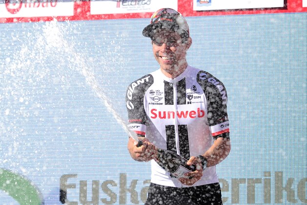 Team Sunweb's Australian rider Michael Matthews sprays Cava as he celebrates on the podium after winning the first stage of the 2017 Tour of the Basque country (Vuelta Ciclista al Pais Vasco), a 153.3km route between Iruna and Eguesibar-Sarriguren, near Pamplona on April 3, 2017. / AFP PHOTO / ANDER GILLENEA (Photo credit should read ANDER GILLENEA/AFP/Getty Images) Team Sunweb's Australian rider Michael Matthews sprays Cava as he celebrates on the podium after winning the first stage of the 2017 Tour of the Basque country (Vuelta Ciclista al Pais Vasco), a 153.3km route between Iruna and Eguesibar-Sarriguren, near Pamplona on April 3, 2017. / AFP PHOTO / ANDER GILLENEA (Photo credit should read ANDER GILLENEA/AFP/Getty Images)