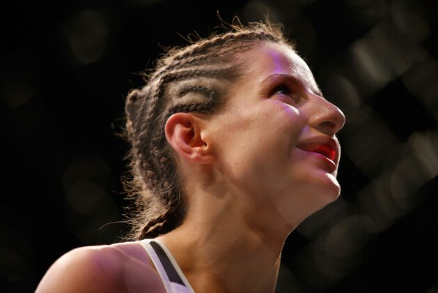SAN DIEGO, CA - JULY 15:   Sarah Moras of Canada enters the octagon before facing Jessica Andrade of Brazil in their women's bantamweight bout during the UFC event at the Valley View Casino Center on July 15, 2015 in San Diego, California. (Photo by Todd Warshaw/Zuffa LLC/Zuffa LLC via Getty Images)
