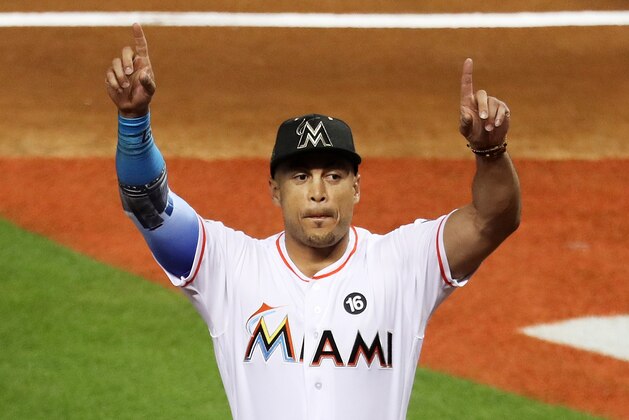 MIAMI, FL - JULY 11:  Giancarlo Stanton #27 of the Miami Marlins and the National League reacts prior to the 88th MLB All-Star Game between the National League All-Stars and the American League All-Stars at Marlins Park on July 11, 2017 in Miami, Florida.  (Photo by Rob Carr/Getty Images)