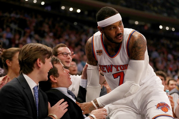 NEW YORK, NY - APRIL 12: Carmelo Anthony #7 of the New York Knicks falls into the crowd as he goes after a ball in the first quarter against the Philadelphia 76ers at Madison Square Garden on April 12, 2017 in New York City. NOTE TO USER: User expressly acknowledges and agrees that, by downloading and or using this Photograph, user is consenting to the terms and conditions of the Getty Images License Agreement (Photo by Elsa/Getty Images) NEW YORK, NY - APRIL 12: Carmelo Anthony #7 of the New York Knicks falls into the crowd as he goes after a ball in the first quarter against the Philadelphia 76ers at Madison Square Garden on April 12, 2017 in New York City. NOTE TO USER: User expressly acknowledges and agrees that, by downloading and or using this Photograph, user is consenting to the terms and conditions of the Getty Images License Agreement (Photo by Elsa/Getty Images)