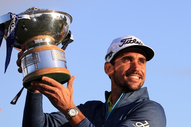 TROON, SCOTLAND - JULY 16:  Rafa Cabrera-Bello of Spain poses with the trophy following his victory on the 1st play off hole during the final round of the AAM Scottish Open at Dundonald Links Golf Course on July 16, 2017 in Troon, Scotland.  (Photo by Andrew Redington/Getty Images)