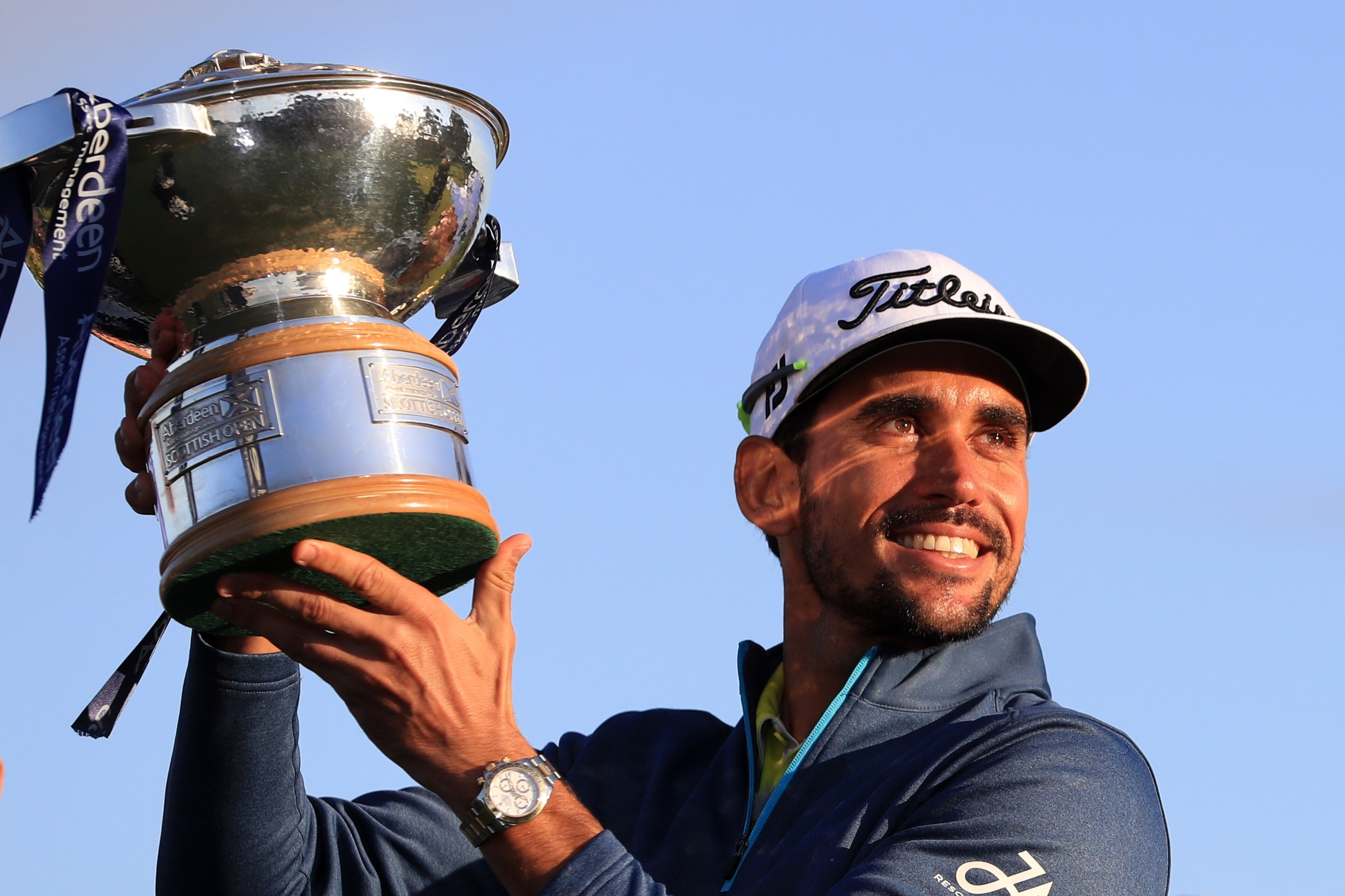 TROON, SCOTLAND - JULY 16:  Rafa Cabrera-Bello of Spain poses with the trophy following his victory on the 1st play off hole during the final round of the AAM Scottish Open at Dundonald Links Golf Course on July 16, 2017 in Troon, Scotland.  (Photo by Andrew Redington/Getty Images)