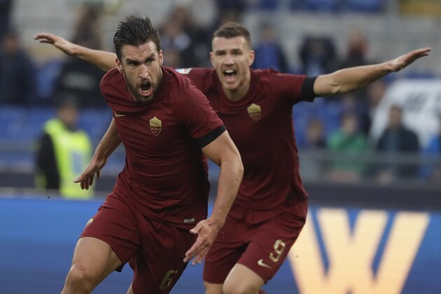 Roma's Kevin Strootman celebrates after scoring during a Serie A soccer match between Lazio and Roma, at the Rome Olympic stadium Sunday, Dec. 4, 2016. (AP Photo/Gregorio Borgia)