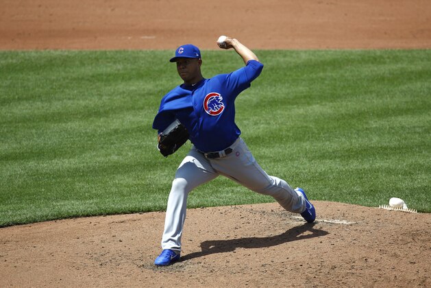 Chicago Cubs starting pitcher Jose Quintana throws to the Baltimore Orioles during a baseball game in Baltimore, Sunday, July 16, 2017. (AP Photo/Patrick Semansky)