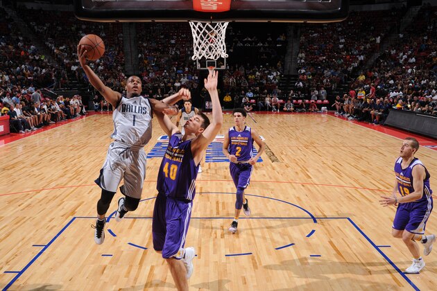 LAS VEGAS, NV - JULY 16: Dennis Smith Jr. #1 of the Dallas Mavericks goes to the basket against the Los Angeles Lakers during the 2017 Summer League Semifinals on July 16, 2017 at the Thomas & Mack Center in Las Vegas, Nevada. NOTE TO USER: User expressly acknowledges and agrees that, by downloading and/or using this Photograph, user is consenting to the terms and conditions of the Getty Images License Agreement. Mandatory Copyright Notice: Copyright 2017 NBAE (Photo by Garrett Ellwood/NBAE via Getty Images)