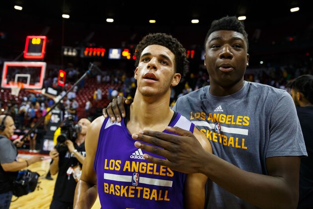 Jul 15, 2017; Las Vegas, NV, USA; Los Angeles Lakers guard Lonzo Ball (left) celebrates with center Thomas Bryant after defeating the Brooklyn Nets during an NBA Summer League game at Thomas & Mack Center. Mandatory Credit: Mark J. Rebilas-USA TODAY Sports Jul 15, 2017; Las Vegas, NV, USA; Los Angeles Lakers guard Lonzo Ball (left) celebrates with center Thomas Bryant after defeating the Brooklyn Nets during an NBA Summer League game at Thomas & Mack Center. Mandatory Credit: Mark J. Rebilas-USA TODAY Sports