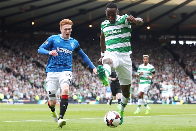 GLASGOW, SCOTLAND - APRIL 23: Moussa Dembele of Celtic controls the ball under pressure of David Bates of Rangers during the Scottish Cup Semi-Final match between Celtic and Rangers at Hampden Park on April 23, 2017 in Glasgow, Scotland.  (Photo by Ian MacNicol/Getty Images)