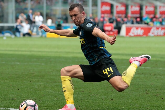 MILAN, ITALY - MAY 14: Ivan Perisic of FC Internazionale Milano in action during the Serie A match between FC Internazionale and US Sassuolo at Stadio Giuseppe Meazza on May 14, 2017 in Milan, Italy. (Photo by Emilio Andreoli/Getty Images) MILAN, ITALY - MAY 14: Ivan Perisic of FC Internazionale Milano in action during the Serie A match between FC Internazionale and US Sassuolo at Stadio Giuseppe Meazza on May 14, 2017 in Milan, Italy. (Photo by Emilio Andreoli/Getty Images)