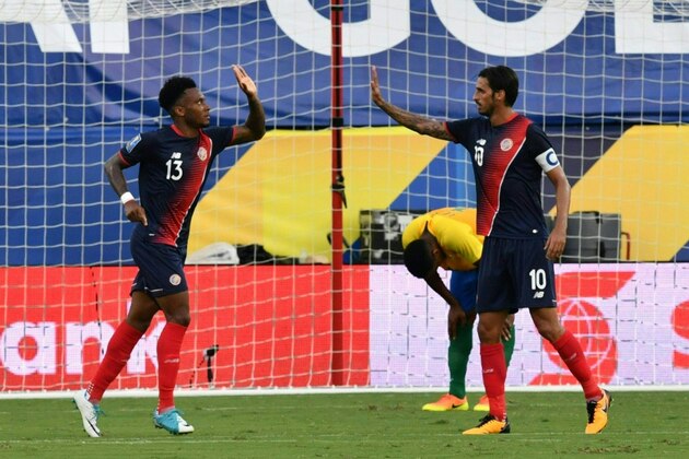 Rodney Wallace (L) and Bryan ruiz of Costa Rica celebrate after the seconde goal against French Guiana during their CONCACAF Gold Cup match on July 14, 2017 in Frisco, Texas. / AFP PHOTO / Nicholas Kamm (Photo credit should read NICHOLAS KAMM/AFP/Getty Images) Rodney Wallace (L) and Bryan ruiz of Costa Rica celebrate after the seconde goal against French Guiana during their CONCACAF Gold Cup match on July 14, 2017 in Frisco, Texas. / AFP PHOTO / Nicholas Kamm (Photo credit should read NICHOLAS KAMM/AFP/Getty Images)