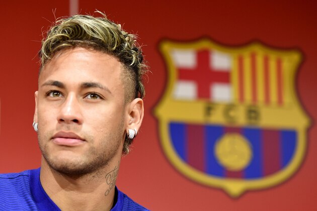 FC Barcelona football star Neymar answers questions during a press conference to announce new sponsorship with Japanese internet retailer Rakuten in Tokyo on July 13, 2017.
Japan's major internet retailer Rakuten entered into main sponsorship contract with FC Barcelona. / AFP PHOTO / Toru YAMANAKA (Photo credit should read TORU YAMANAKA/AFP/Getty Images) FC Barcelona football star Neymar answers questions during a press conference to announce new sponsorship with Japanese internet retailer Rakuten in Tokyo on July 13, 2017.
Japan's major internet retailer Rakuten entered into main sponsorship contract with FC Barcelona. / AFP PHOTO / Toru YAMANAKA (Photo credit should read TORU YAMANAKA/AFP/Getty Images)