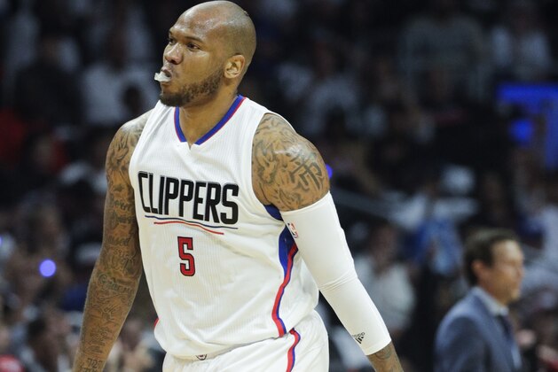 Los Angeles Clippers' Marreese Speights celebrates his 3-point basket against the Utah Jazz during the first half in Game 2 of an NBA basketball first-round playoff series Tuesday, April 18, 2017, in Los Angeles. (AP Photo/Jae C. Hong)