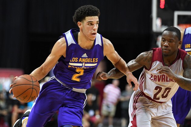 Jul 13, 2017; Las Vegas, NV, USA; Los Angeles Lakers guard Lonzo Ball (2) dribbles against the defense of Cleveland Cavaliers guard Kay Felder (20) during an NBA Summer League game at Thomas & Mack Center. Mandatory Credit: Stephen R. Sylvanie-USA TODAY Sports