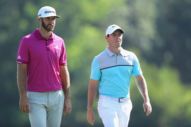PONTE VEDRA BEACH, FL - MAY 12: Dustin Johnson of the United States and Rory McIlroy of Northern Ireland walk on the 14th hole during the second round of THE PLAYERS Championship at the Stadium course at TPC Sawgrass on May 12, 2017 in Ponte Vedra Beach, Florida. (Photo by Warren Little/Getty Images) PONTE VEDRA BEACH, FL - MAY 12: Dustin Johnson of the United States and Rory McIlroy of Northern Ireland walk on the 14th hole during the second round of THE PLAYERS Championship at the Stadium course at TPC Sawgrass on May 12, 2017 in Ponte Vedra Beach, Florida. (Photo by Warren Little/Getty Images)