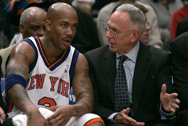 New York Knicks head coach Larry Brown, right, talks to Stephon Marbury during the second half against the Philadelphia 76ers, Saturday, Nov. 26, 2005 at New York's Madison Square Garden. Marbury scored 33 points as the Knicks won the game 105-102 in overtime. (AP Photo/Frank Franklin II)