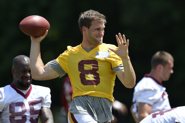 Washington Redskins quarterback Kirk Cousins (8) warms up during NFL football team practice, Tuesday, June 13, 2017, in Ashburn, Va. (AP Photo/Nick Wass)