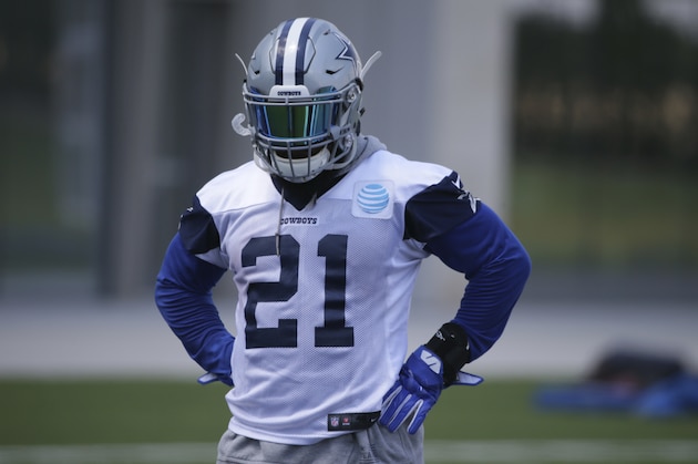 Dallas Cowboys running back Ezekiel Elliott (21) stands on the field during an NFL football team practice in Frisco, Texas, Wednesday, June 7, 2017. (AP Photo/LM Otero)