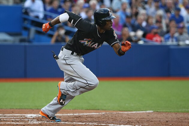 TORONTO, CANADA - JUNE 9: Dee Gordon #9 of the Miami Marlins breakes out of the batterâs box as he grounds out in the fifth inning during MLB game action against the Toronto Blue Jays on June 9, 2015 at Rogers Centre in Toronto, Ontario, Canada. (Photo by Tom Szczerbowski/Getty Images) TORONTO, CANADA - JUNE 9: Dee Gordon #9 of the Miami Marlins breakes out of the batterâs box as he grounds out in the fifth inning during MLB game action against the Toronto Blue Jays on June 9, 2015 at Rogers Centre in Toronto, Ontario, Canada. (Photo by Tom Szczerbowski/Getty Images)