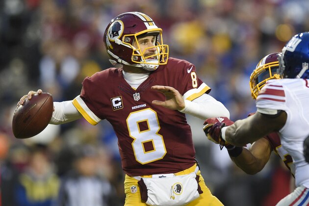In this photo taken Jan. 1, 2017, Washington Redskins quarterback Kirk Cousins (8) passes during the first half of an NFL football game against the New York Giants in Landover, Md. (AP Photo/Nick Wass)