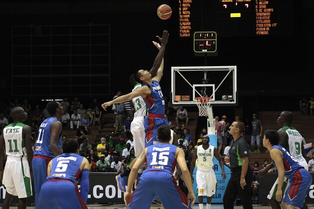 Japeth Aguilar of the Philippines, top right, vies with Senegal's Hamedy Ndiaye, left, during the Group B Basketball World Cup match in Seville, Spain, Thursday, Sept. 4, 2014. The 2014 Basketball World Cup competition will take place in various cities in Spain from Aug. 30 through to Sept. 14. (AP Photo/Miguel Angel Morenatti) Japeth Aguilar of the Philippines, top right, vies with Senegal's Hamedy Ndiaye, left, during the Group B Basketball World Cup match in Seville, Spain, Thursday, Sept. 4, 2014. The 2014 Basketball World Cup competition will take place in various cities in Spain from Aug. 30 through to Sept. 14. (AP Photo/Miguel Angel Morenatti)