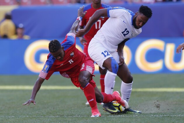 Panama's Edgar Yoel Barcenas, left, and Martinique's Yoann Arquin fight for a loose ball during the second half of a CONCACAF Gold Cup soccer match in Cleveland, Ohio on July 15, 2017. 
Panama beat Martinique 3-0. / AFP PHOTO / Jay LaPrete        (Photo credit should read JAY LAPRETE/AFP/Getty Images)
