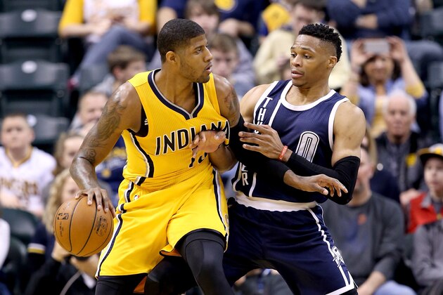 INDIANAPOLIS, IN - MARCH 19:  Paul George #13 of the Indiana Pacers dribbles the ball while defended by Russell Westbrook #0 of the Oklahoma City Thunder at Bankers Life Fieldhouse on March 19, 2016 in Indianapolis, Indiana.   NOTE TO USER: User expressly acknowledges and agrees that, by downloading and or using this photograph, User is consenting to the terms and conditions of the Getty Images License Agreement.  (Photo by Andy Lyons/Getty Images)
